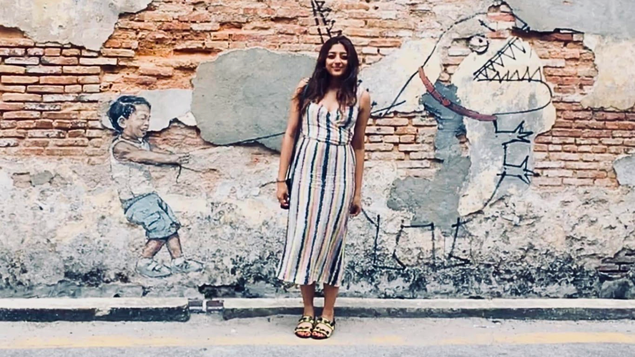 In Penang, in front of the iconic street art